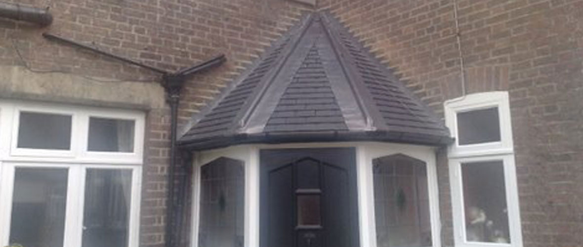 Slate roof above door
